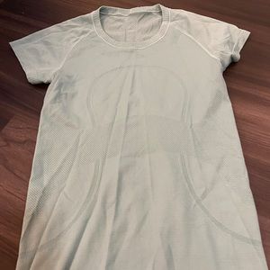 Light blue greyish Lululemon swiftly tech shirt